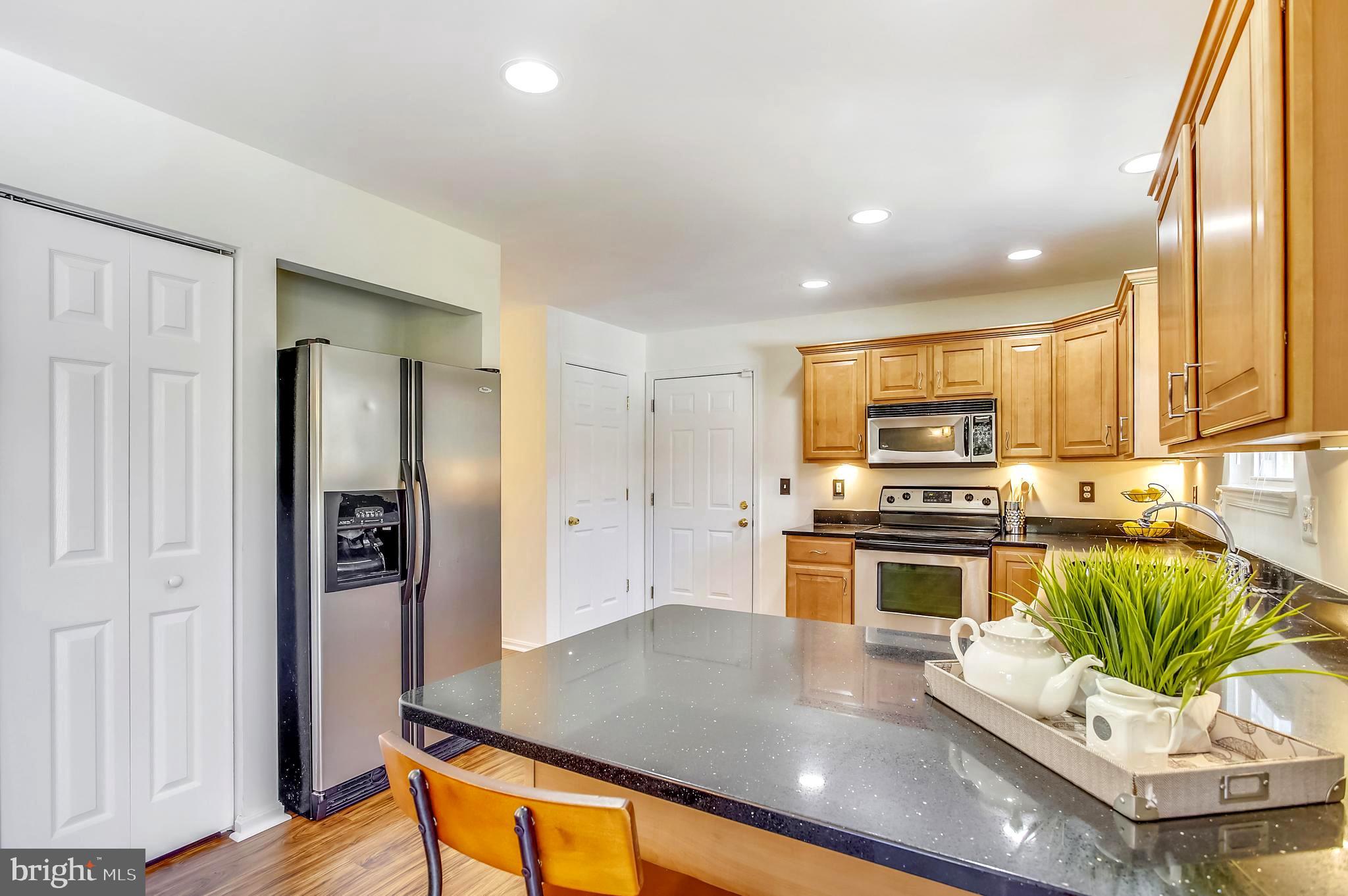 1662 Cape May Road Baltimore, MD 21221 - Photo 10 of 37 Kitchen- Granite and Stainless Steel