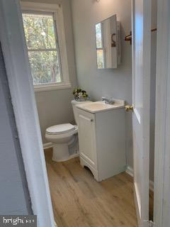 223 Kinsley Road Pemberton, NJ 08068 - Photo 6 of 12 a bathroom with a sink toilet and window