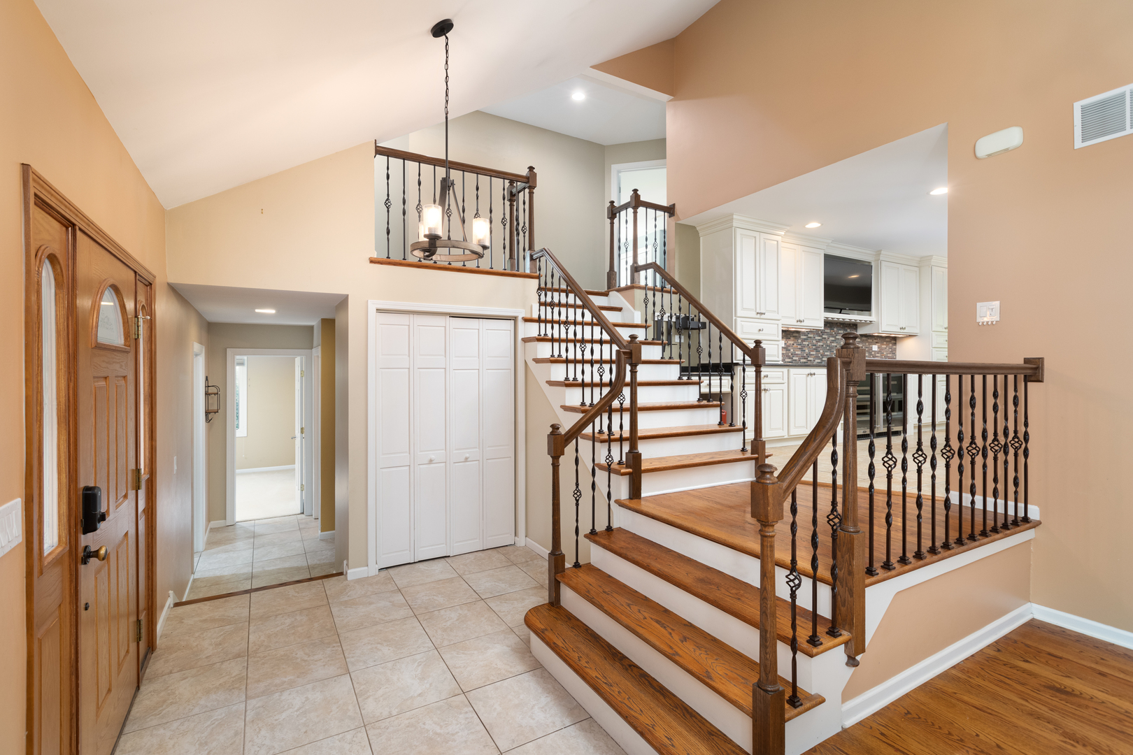 729 East Bauer Road Naperville, IL 60563 - Photo 15 of 57 a view of entryway and hall with wooden floor