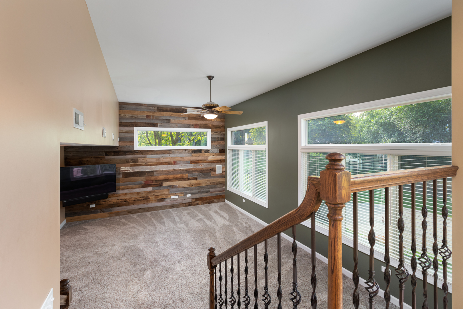 729 East Bauer Road Naperville, IL 60563 - Photo 20 of 57 a view of an empty room with a fireplace and a window