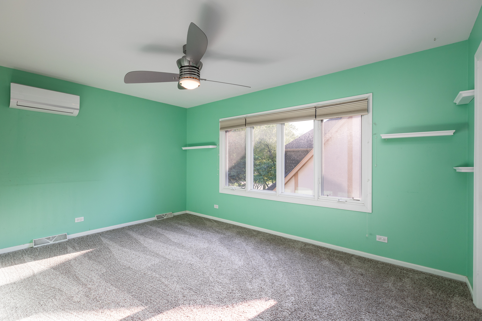 729 East Bauer Road Naperville, IL 60563 - Photo 40 of 57 a view of an empty room with a window