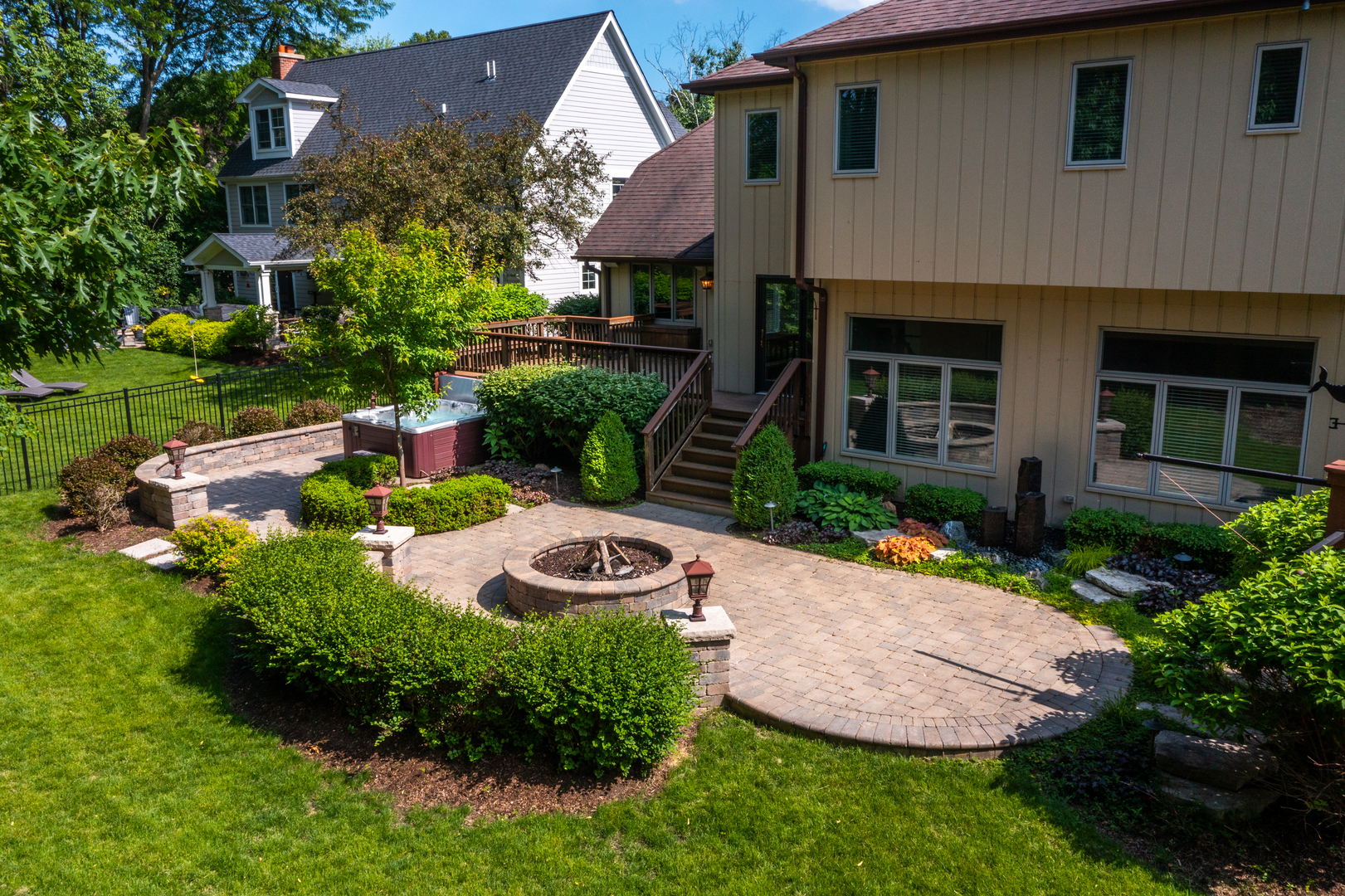 729 East Bauer Road Naperville, IL 60563 - Photo 53 of 57 a front view of a house with a garden and outdoor seating