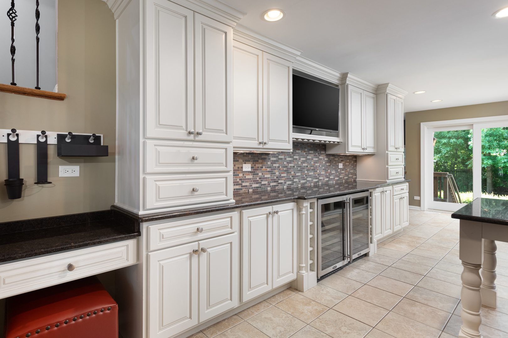 729 East Bauer Road Naperville, IL 60563 - Photo 9 of 57 a kitchen with granite countertop white cabinets stainless steel appliances and a sink