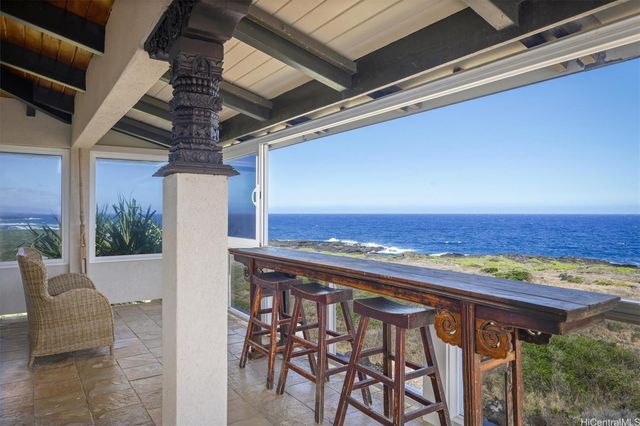 a bedroom with furniture and a flat screen tv