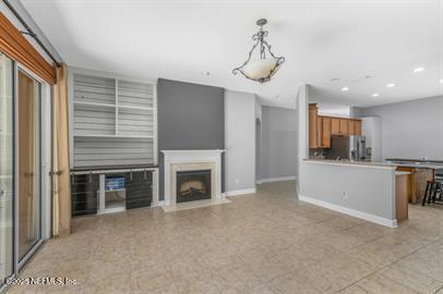 32330 Sunny Parke Drive Fernandina Beach, FL 32034 - Photo 15 of 38 a view of a kitchen with a sink and a stove top oven