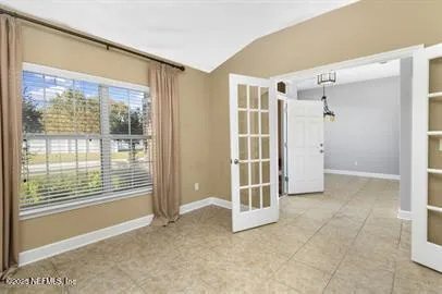 an empty room with windows