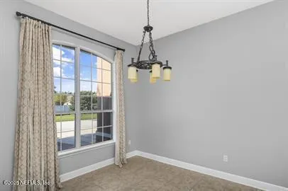 a view of a hallway view with wooden floor