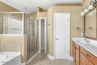 a bathroom with a double vanity sink mirror and double