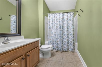32330 Sunny Parke Drive Fernandina Beach, FL 32034 - Photo 33 of 38 a bathroom with a granite countertop sink a toilet and a shower