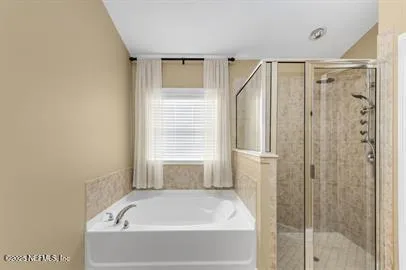 a view of hallway with a sink and a mirror