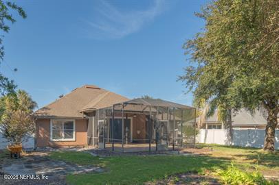32330 Sunny Parke Drive Fernandina Beach, FL 32034 - Photo 7 of 38 front view of a house with a yard