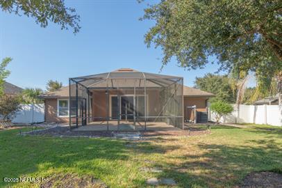 32330 Sunny Parke Drive Fernandina Beach, FL 32034 - Photo 10 of 38 a front view of a house with a yard