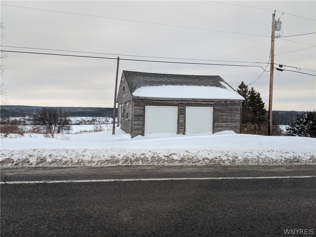 0 Route 98 North Rd Arcade Arcade, NY 14009 - Photo 1 of 1 2 car garage with new windows ad doors. on about a