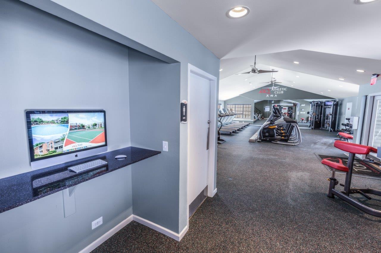 291 Lincoln Oaks Drive, Unit 1716 Willowbrook, IL 60527 - Photo 10 of 12 a living room with furniture and a flat screen tv