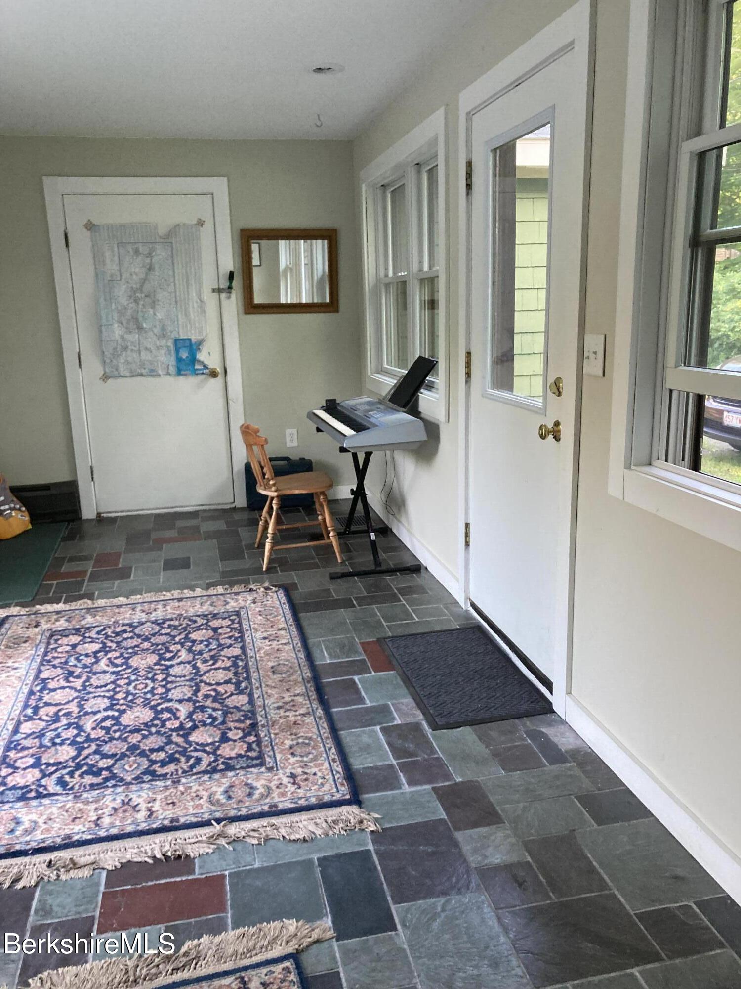 14 Blotz Road Washington, MA 01223 - Photo 15 of 28 a living room with furniture and a rug