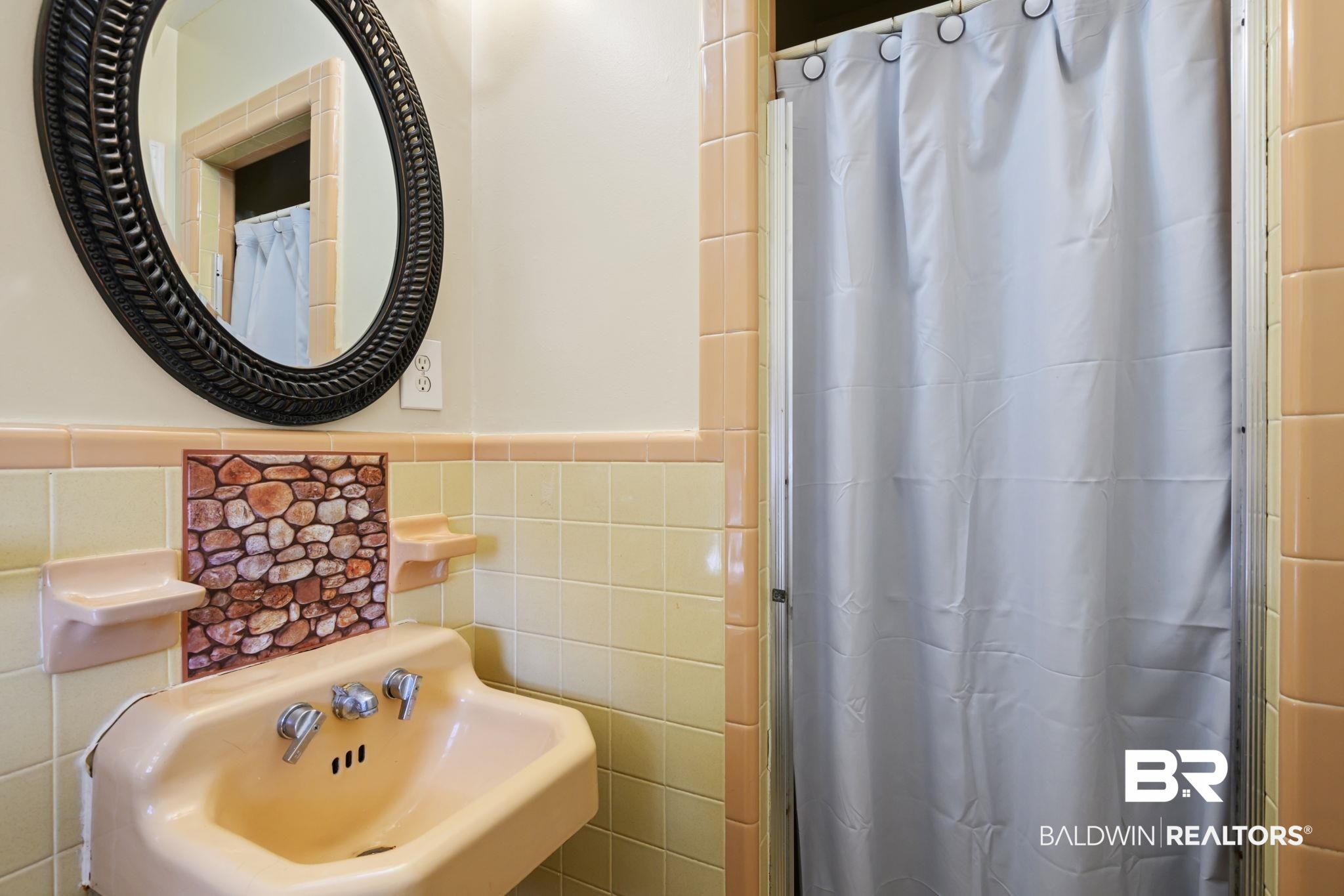 4105 Libby Drive Mobile, AL 36693 - Photo 13 of 26 Bathroom featuring tile walls, sink, and a shower with shower curtain