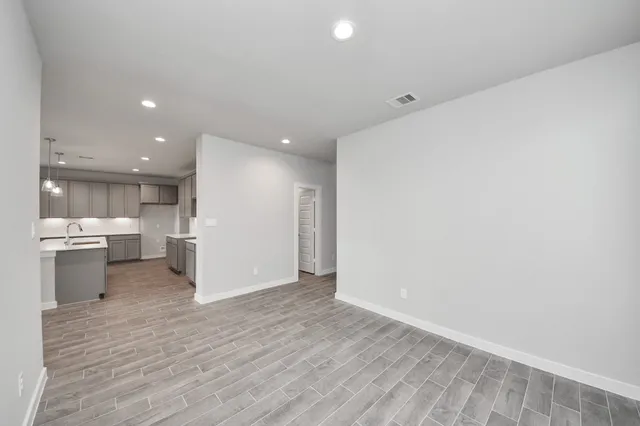a view of kitchen with wooden floor