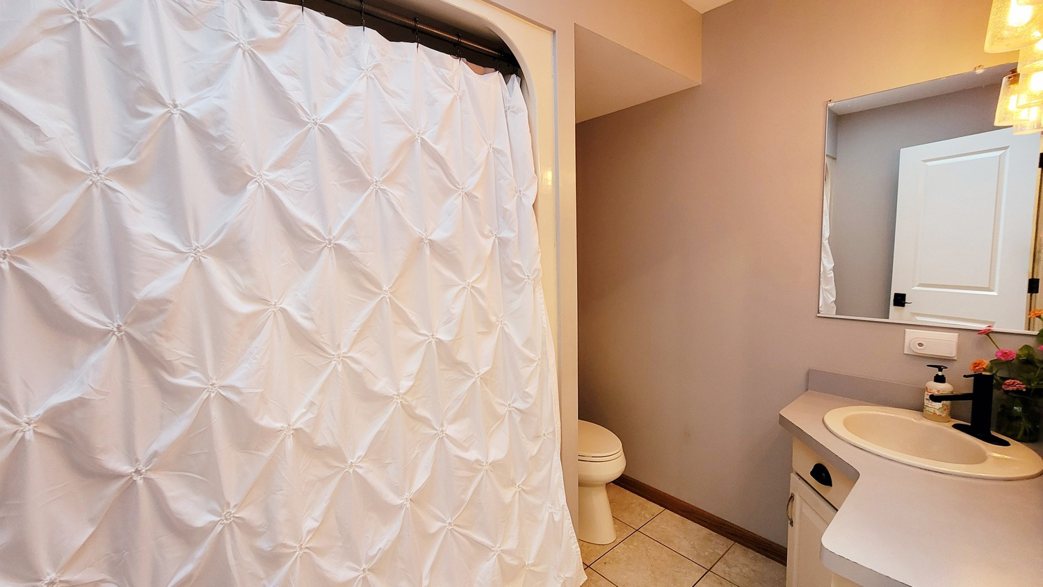 6514 Hamilton Road Huntley, IL 60142 - Photo 13 of 40 a white toilet sitting next to a white sink