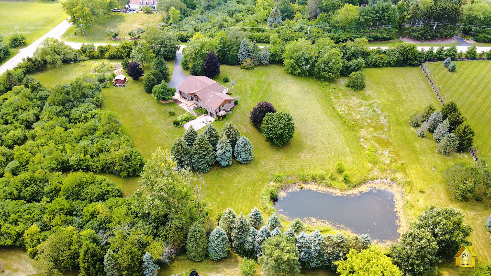6514 Hamilton Road Huntley, IL 60142 - Photo 15 of 40 an aerial view of residential house with swimming pool and lawn chairs