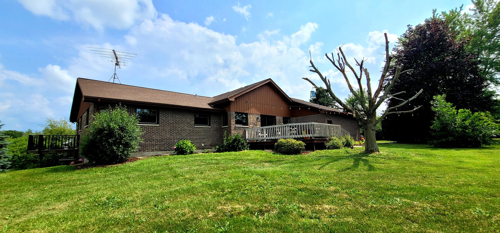 6514 Hamilton Road Huntley, IL 60142 - Photo 3 of 40 a front view of a house with a yard and garage