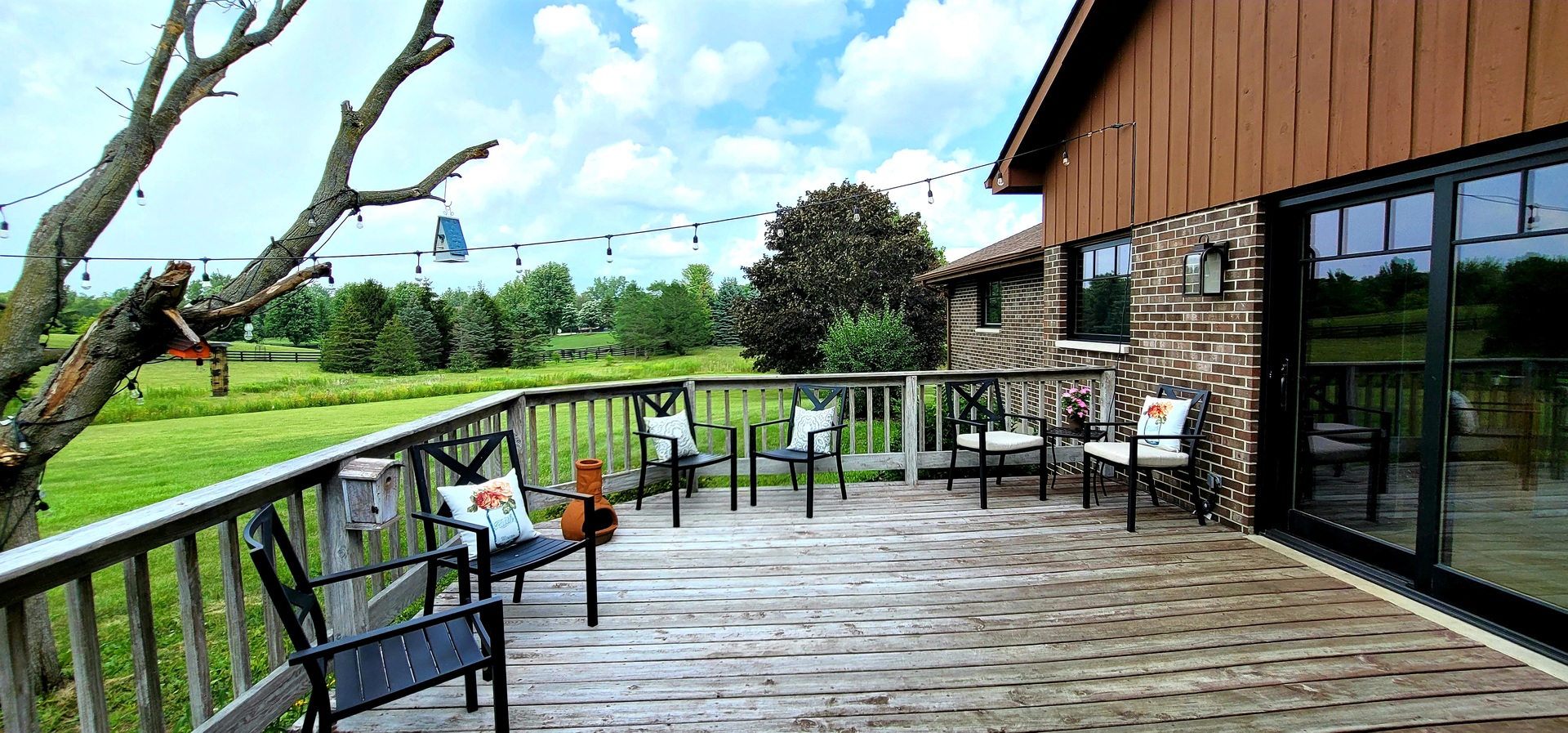 6514 Hamilton Road Huntley, IL 60142 - Photo 27 of 40 a view of balcony with wooden floor and outdoor seating