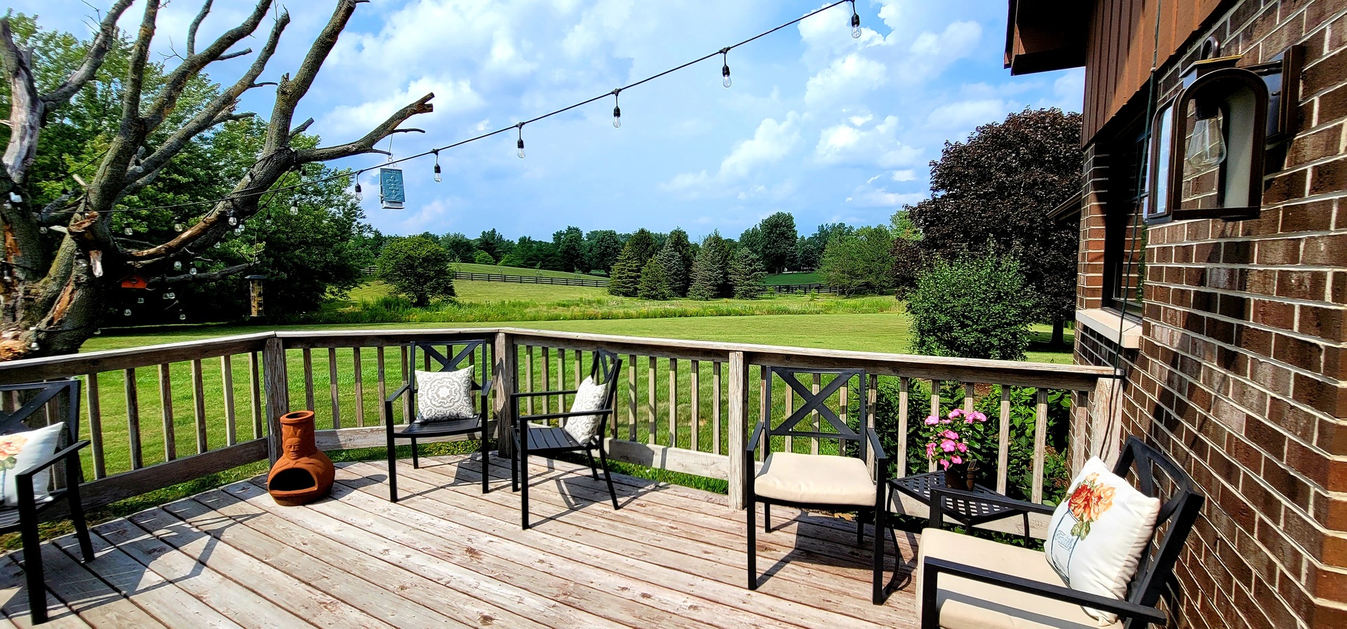 6514 Hamilton Road Huntley, IL 60142 - Photo 30 of 40 a view of a balcony with wooden floor and outdoor seating
