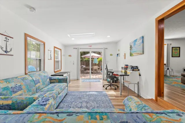 a living room with furniture and a table