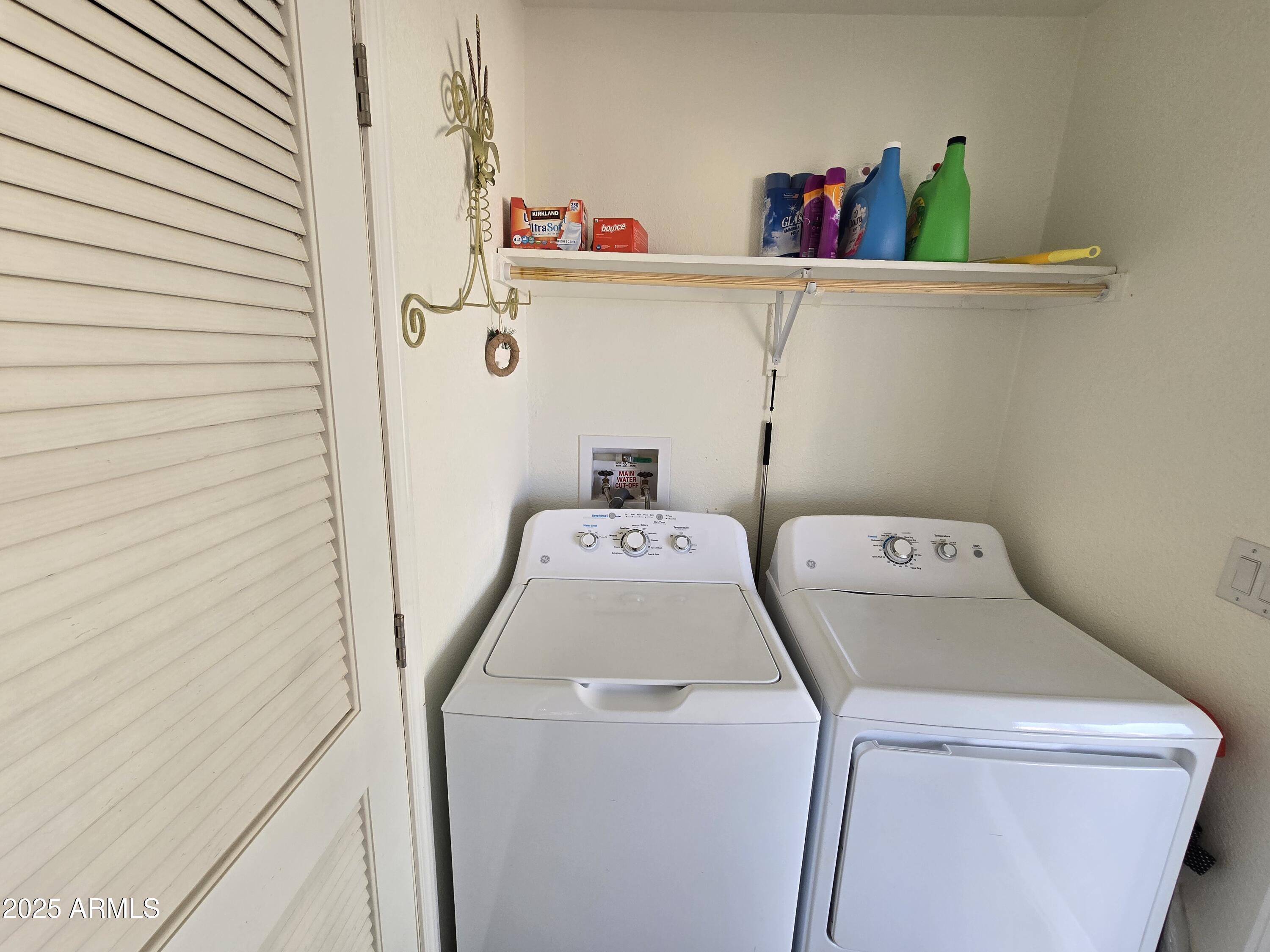 2000 South Apache Road, Unit 277 Buckeye, AZ 85326 - Photo 12 of 13 a utility room with dryer and washer