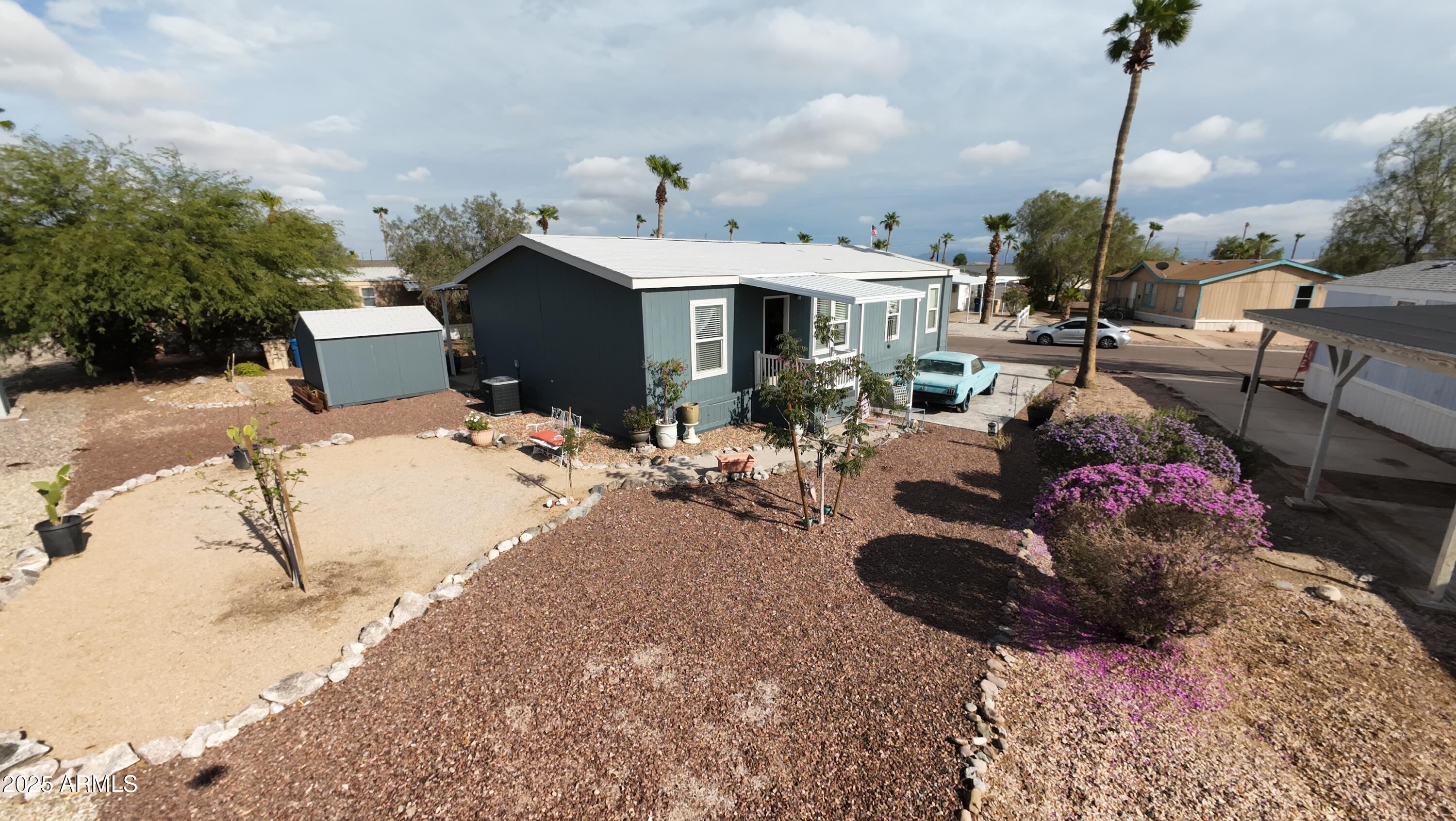 2000 South Apache Road, Unit 277 Buckeye, AZ 85326 - Photo 3 of 13 a view of a terrace with sitting area