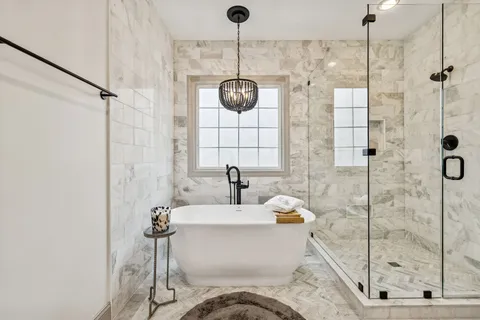 a bathroom with a sink and a shower