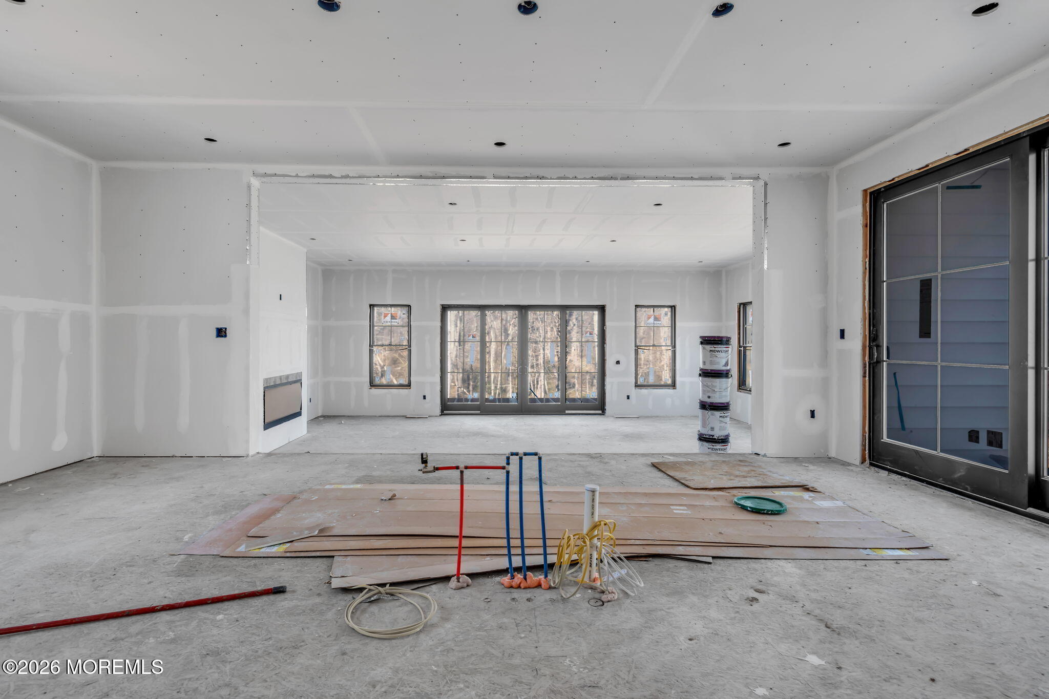 104 Back Bone Hill Road Millstone Township, NJ 08510 - Photo 11 of 26 a living room with a couch and a window