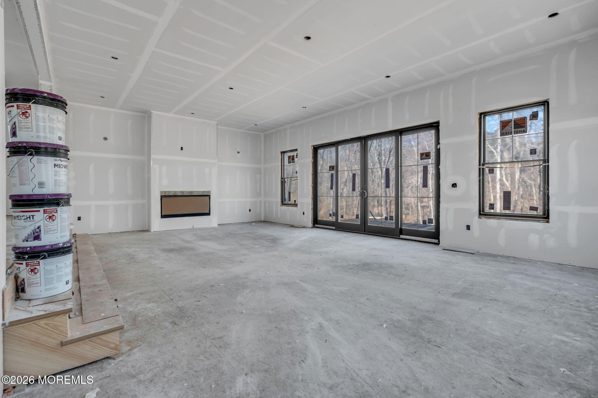 104 Back Bone Hill Road Millstone Township, NJ 08510 - Photo 7 of 26 a view of an empty room with cabinet and window