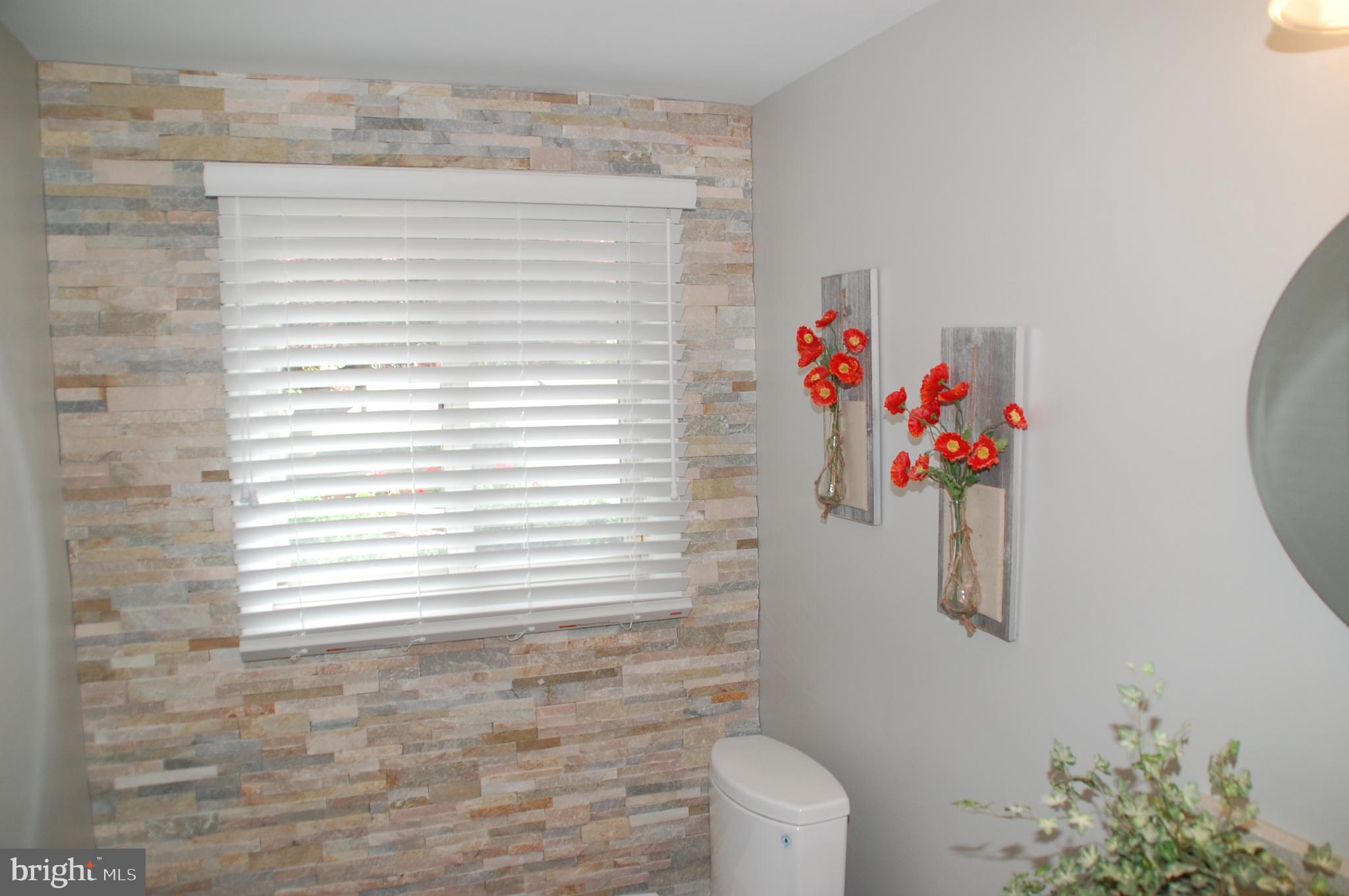 1349 Nevarc Road Warminster, PA 18974 - Photo 29 of 45 Attractive stone accent wall in Powder Room...