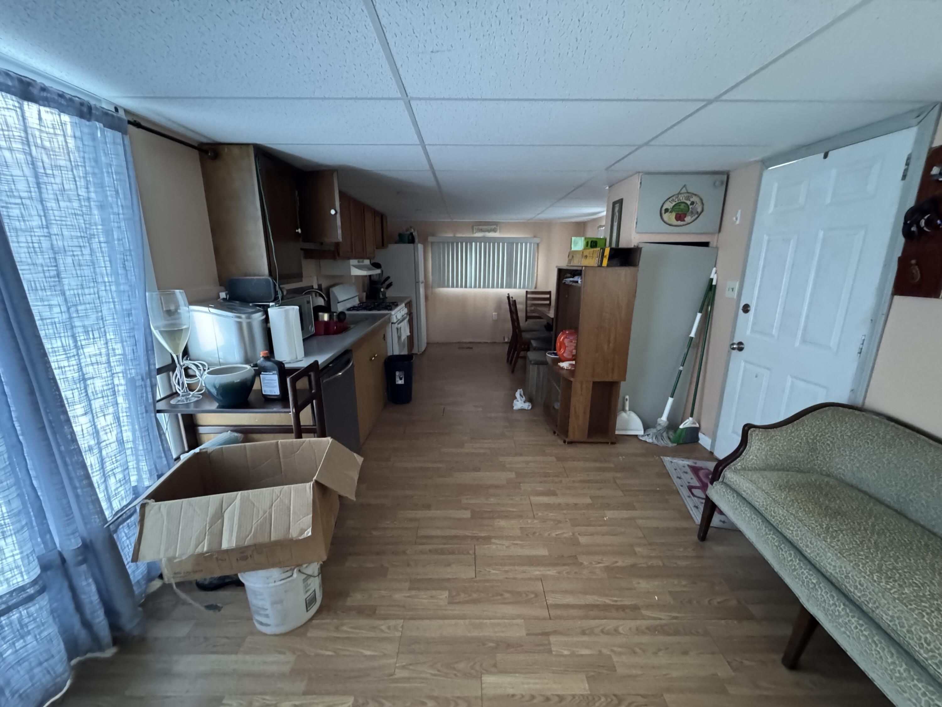 1741 Scott Road Olyphant, PA 18447 - Photo 7 of 11 a view of a living room with furniture and a flat screen tv