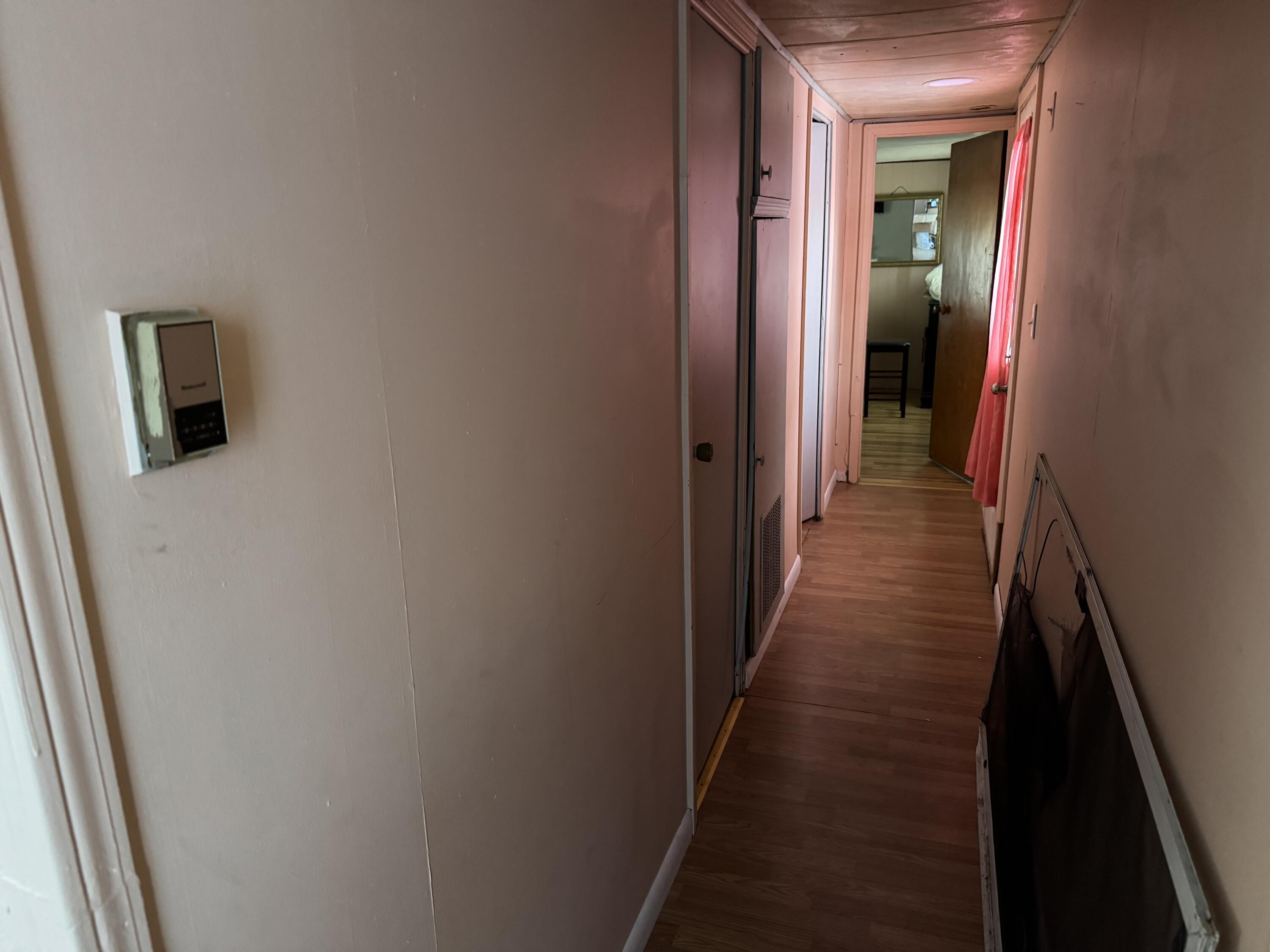 1741 Scott Road Olyphant, PA 18447 - Photo 9 of 11 a view of a hallway with a wooden floor