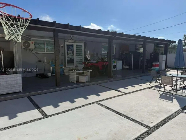 a view of a house with patio