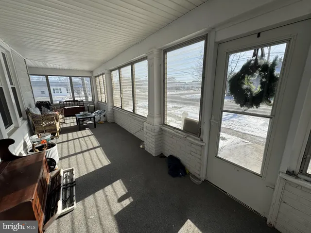 a room with furniture and a window