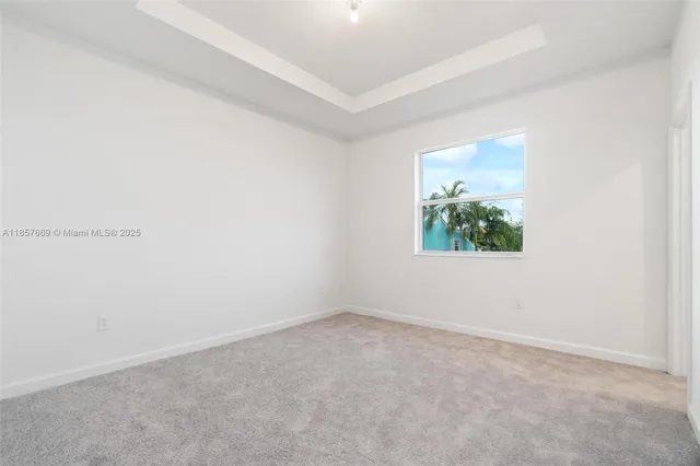 a bathroom with a shower a sink a toilet and mirror