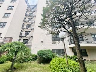 3855 Shore Parkway, Unit 3M Brooklyn, NY 11235 - Photo 2 of 11 front view of a house with a yard