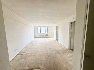 3855 Shore Parkway, Unit 3M Brooklyn, NY 11235 - Photo 4 of 11 a view of an empty room and window