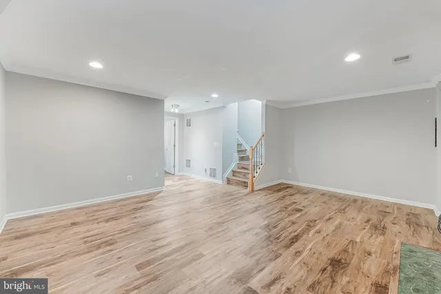 a view of backyard with swimming pool and outdoor seating