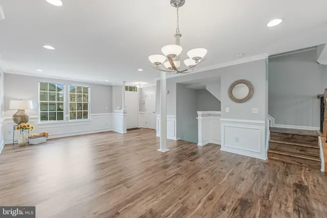 a kitchen with a refrigerator sink and stove