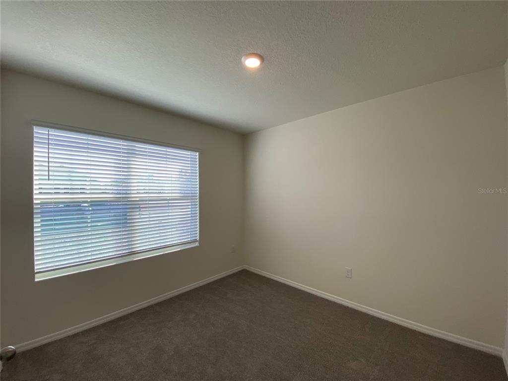 14 Hickory Course Lane Ocala, FL 34472 - Photo 11 of 20 an empty room with a window