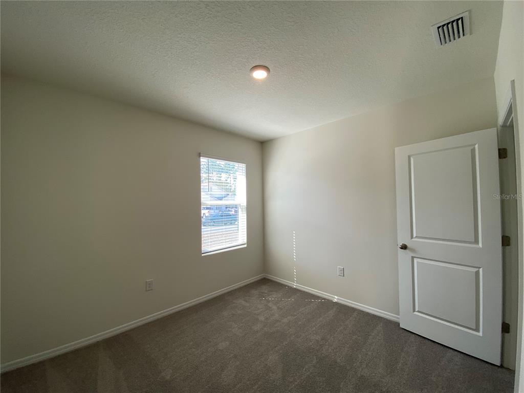 14 Hickory Course Lane Ocala, FL 34472 - Photo 12 of 20 an empty room with a window