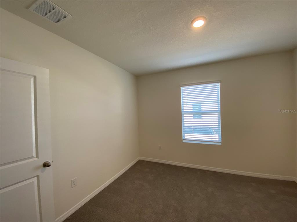 14 Hickory Course Lane Ocala, FL 34472 - Photo 14 of 20 an empty room with a window