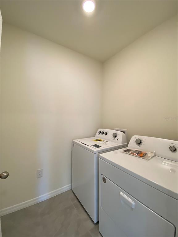 14 Hickory Course Lane Ocala, FL 34472 - Photo 16 of 20 a utility room with dryer and washer