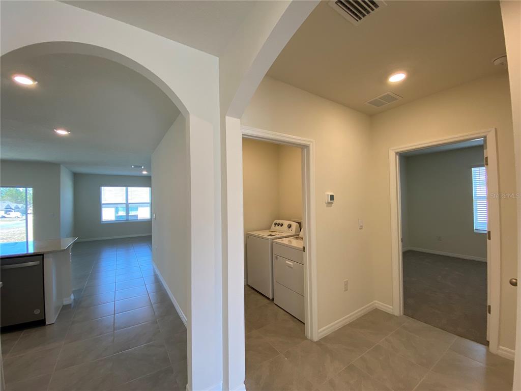 14 Hickory Course Lane Ocala, FL 34472 - Photo 7 of 20 wooden floor in a hall with an entryway of the house