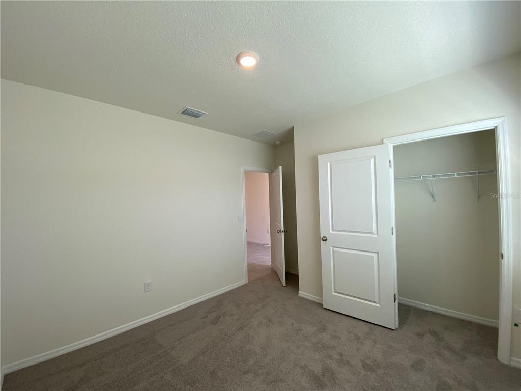 14 Hickory Course Lane Ocala, FL 34472 - Photo 9 of 20 an empty room with closet area