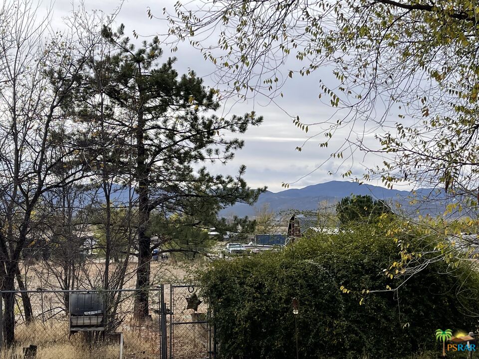 57435 Mitchell Road Anza, CA 92539 - Photo 16 of 16 an aerial view of house with yard and mountain view in back