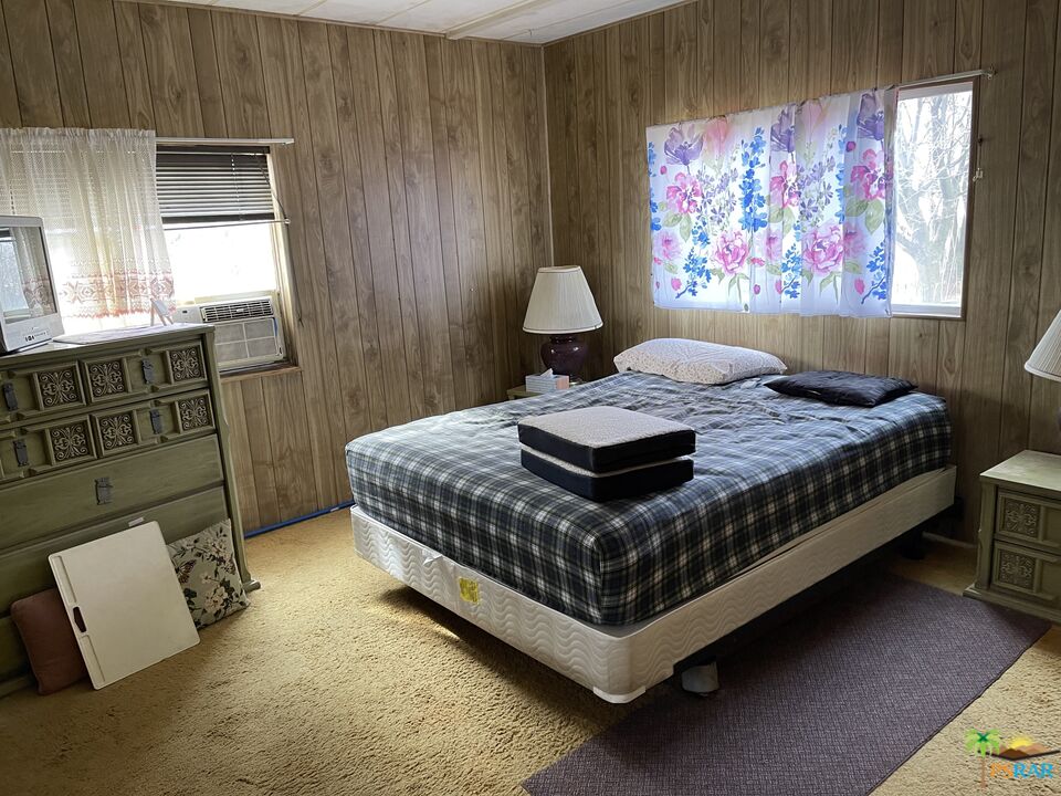 57435 Mitchell Road Anza, CA 92539 - Photo 10 of 16 a bedroom with a bed rug and window